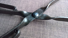Fire tongs forged wrought iron blacksmith handmade rustic designer poker tool
